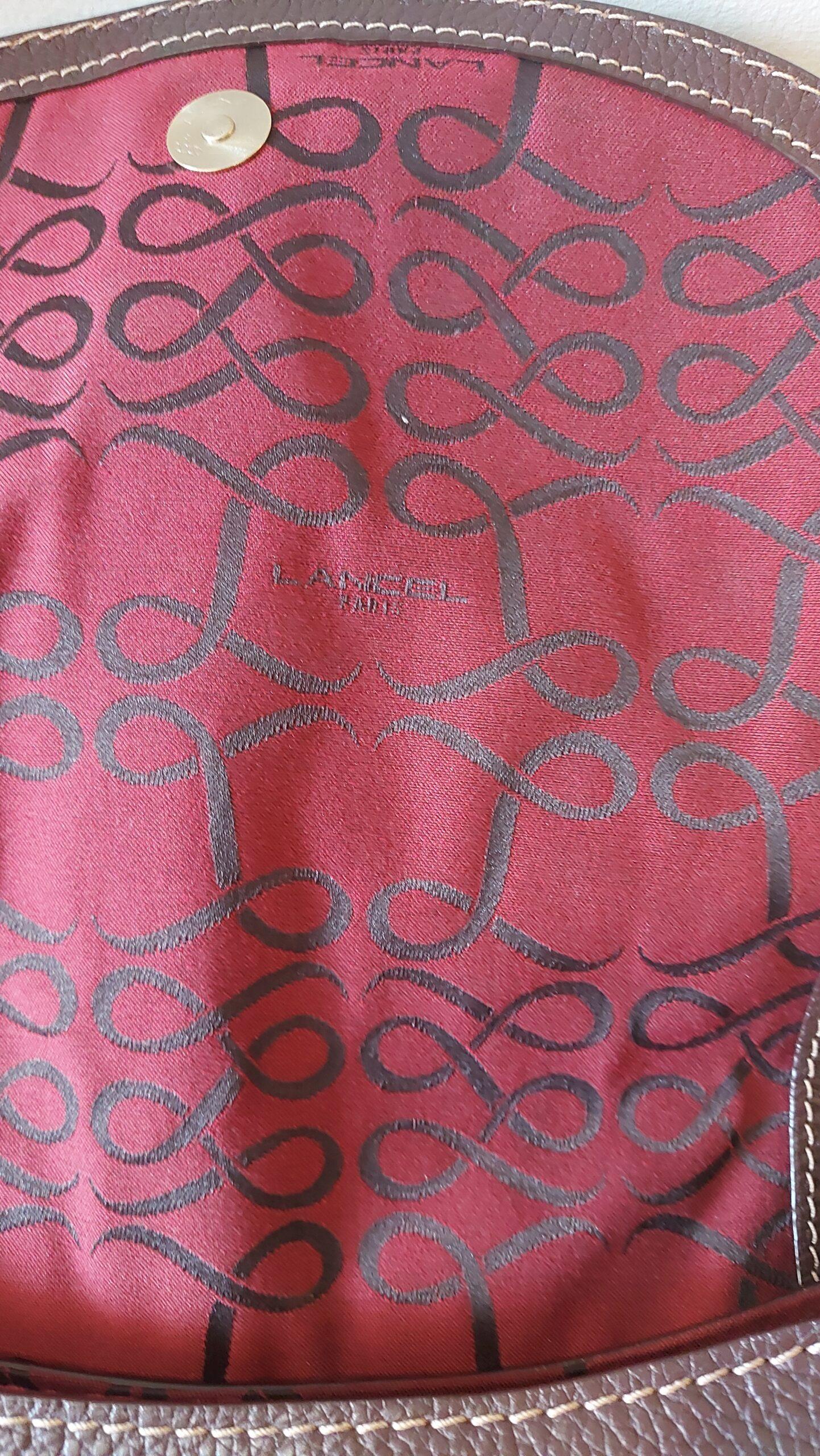 Sac- Sac Lancel- Sac vintage- sac retro- sac en cuir - sac collection premier flirt - sac couleur chocolat - sac avec des surpiqures- sac avec pompon- bag- Lancel bag - vintage bag- retro bag leather bag