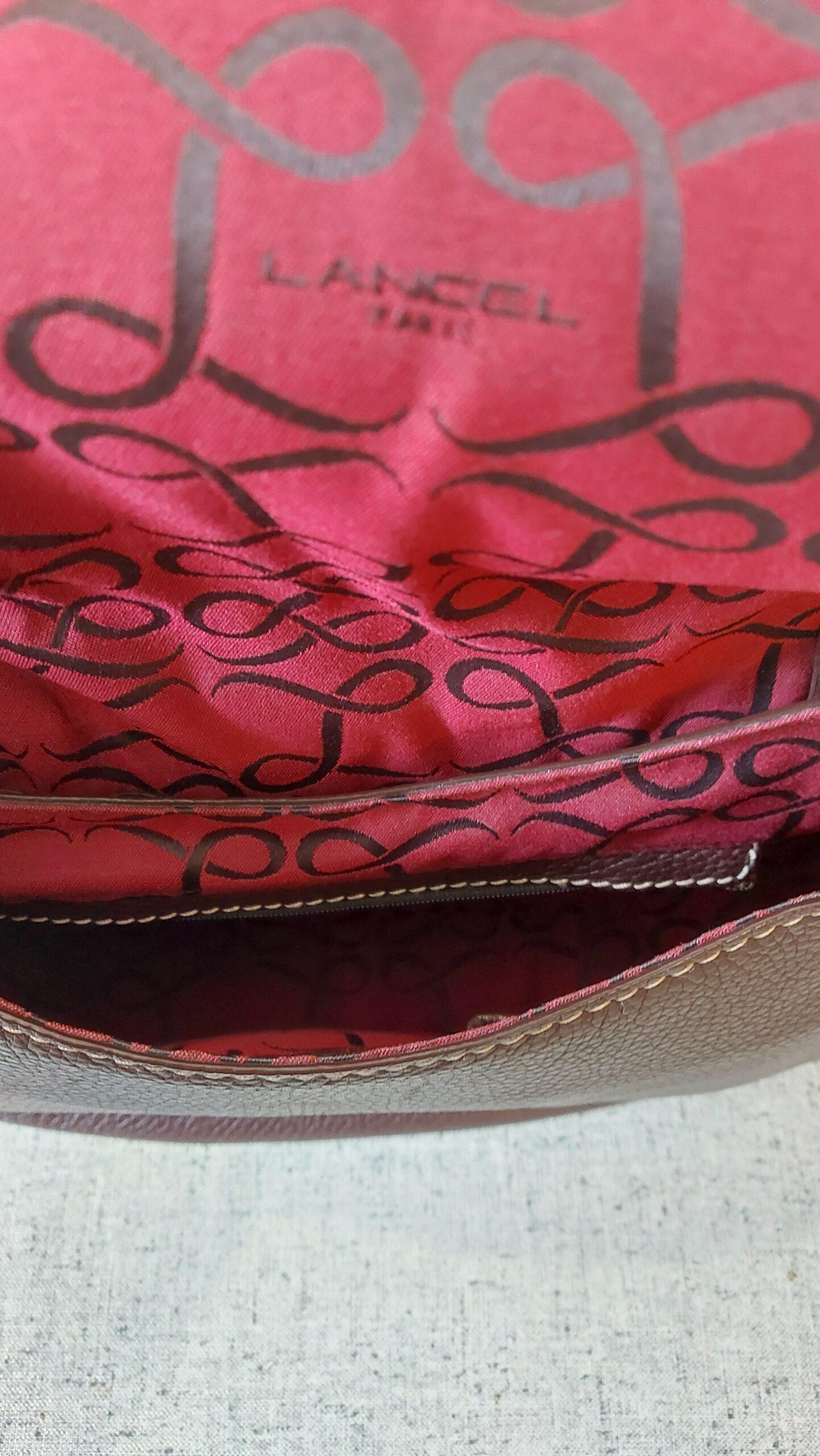 Sac- Sac Lancel- Sac vintage- sac retro- sac en cuir - sac collection premier flirt - sac couleur chocolat - sac avec des surpiqures- sac avec pompon- bag- Lancel bag - vintage bag- retro bag leather bag